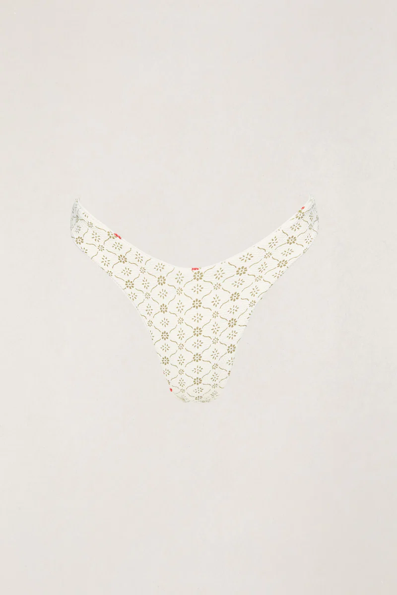 This is an image of Mila Reversible Hi Cut Pant Cream